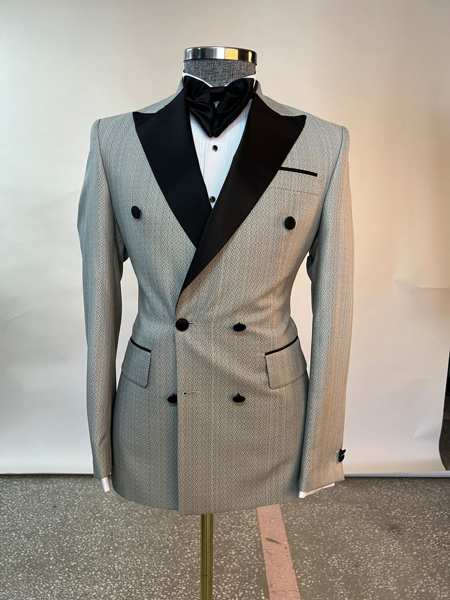 Champagne Double Breasted with Black Lapel over Black Pant. $299.00